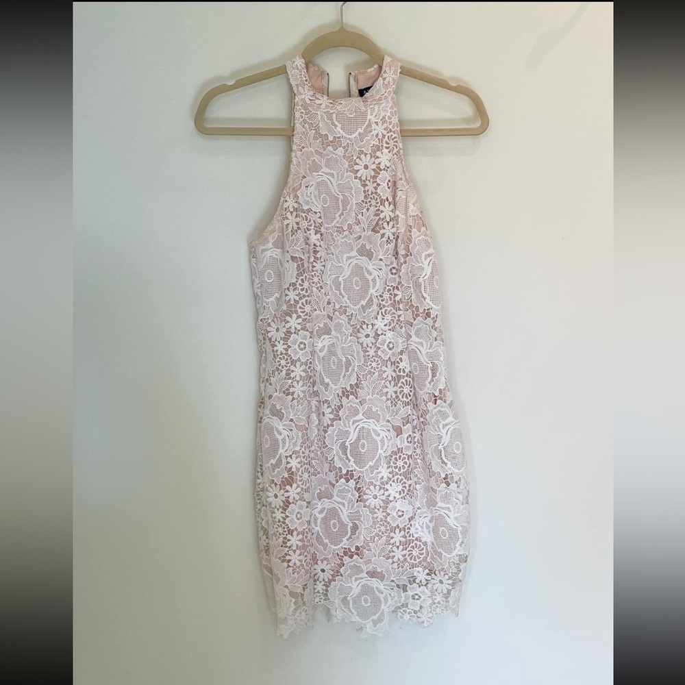 White, lace halter style dress, perfect for shower or party.